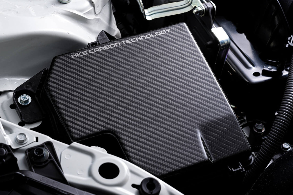 HKS Dry Carbon Fuse Box Cover - 2022-2024 Subaru BRZ / Toyota GR86