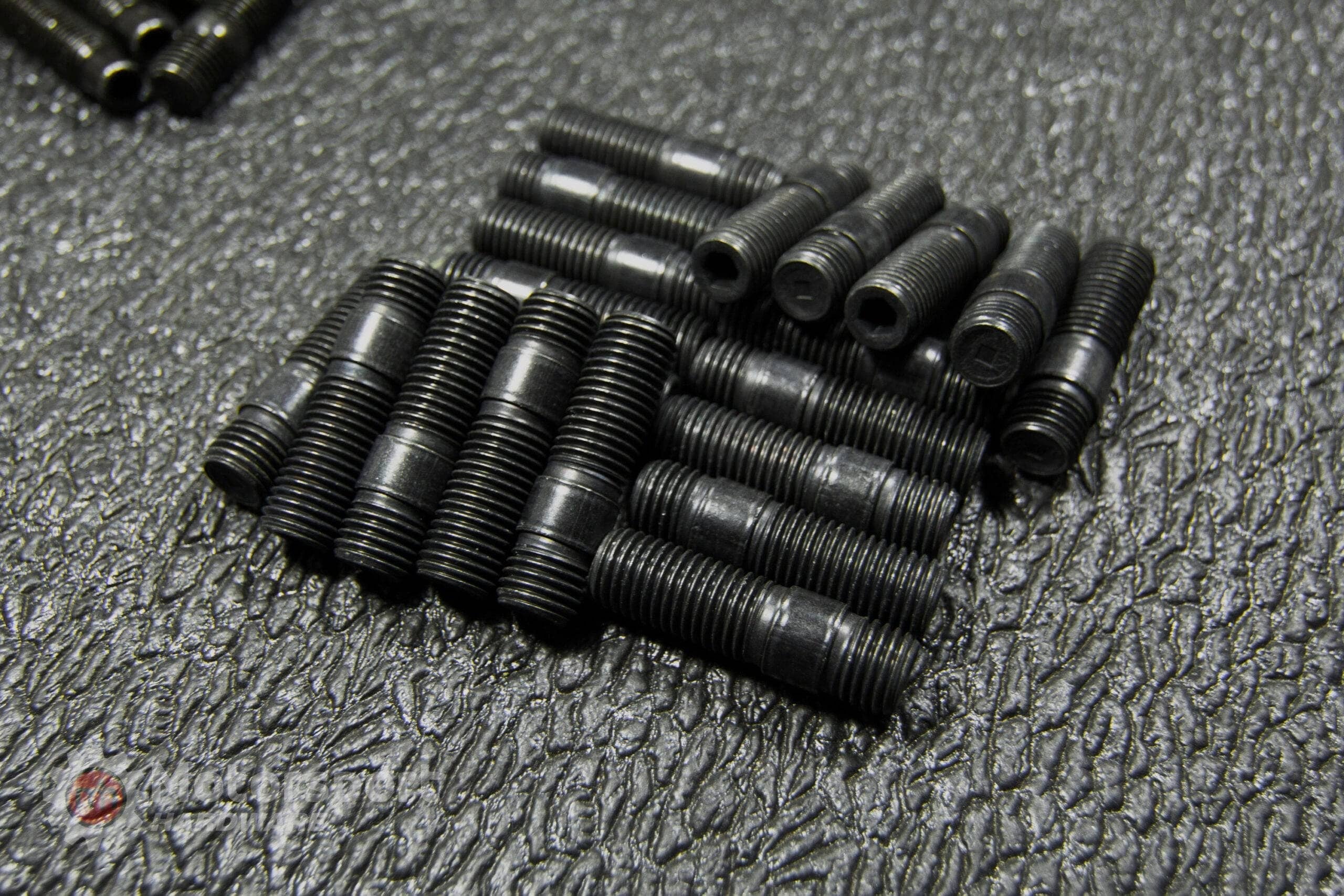 44mm Black Race Stud Kit 12 x 1.5 with Black 17mm MH Titan Nuts