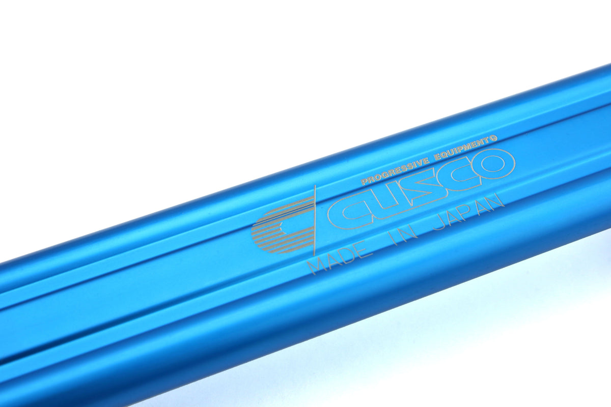 Cusco Battery Tie Down - 2015-2021 Subaru WRX / STI / 2013-2016 Scion FR-S / 2013-2020 Subaru BRZ / 2017-2019 Toyota 86